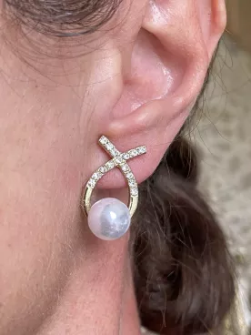 Boucles d’oreilles mariée – Grosse perle nacrée & nœud en strass scintillant