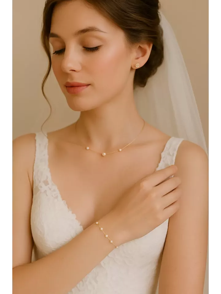 Subtile – Bracelet de Mariée en Perles Nacrées Swarovski sur Fil Doré