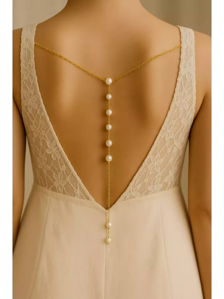 Caraïbes– bijou de dos pour mariée, à coudre, orné de perles nacrées Swarovski Caraïbes– bijou de dos pour mariée, à coudre, orné de perles nacrées Swarovski